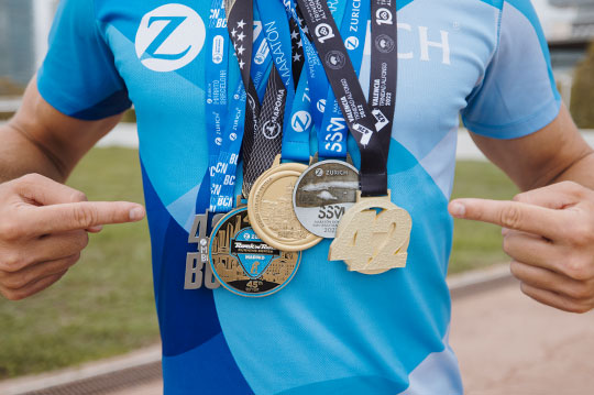 Corredor con 5 medallas de las 5 Grandes de Zurich